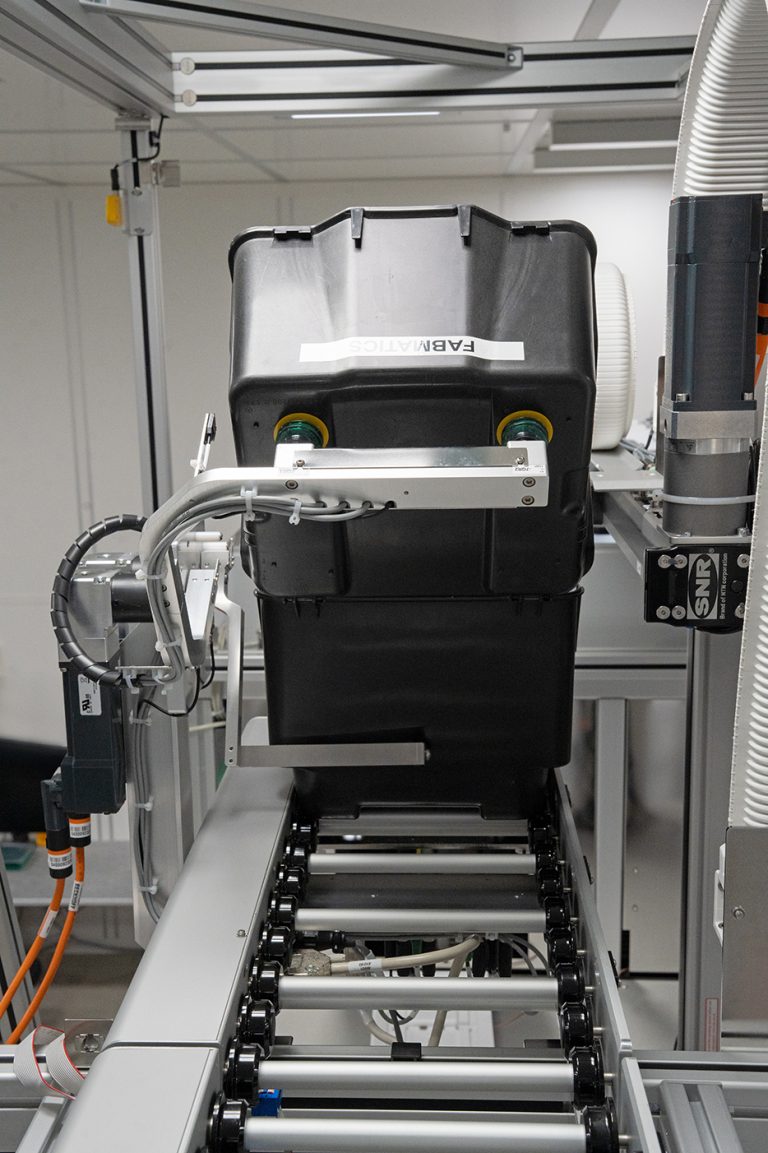 Opened HA200 box and cassette in the automated Box Opening Transfer Unit