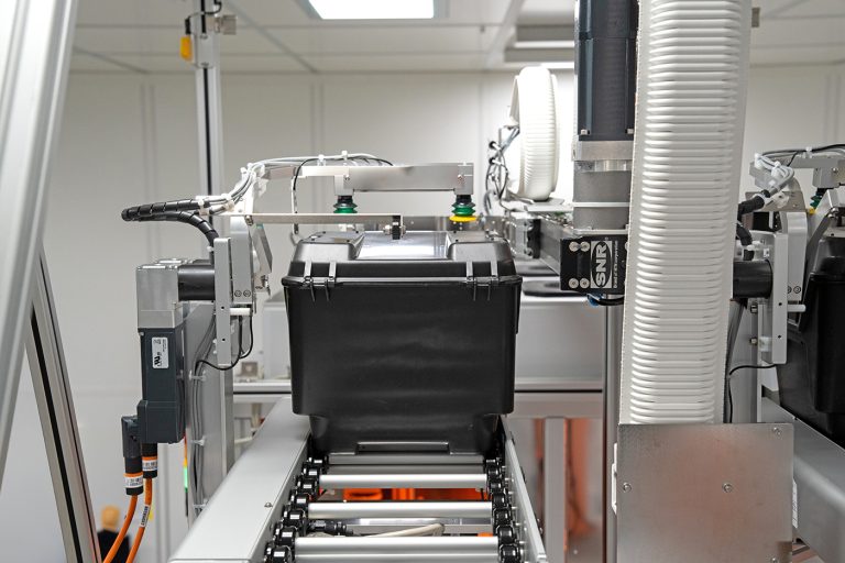 Opened HA200 box and cassette inside the Box Opening Transfer Unit